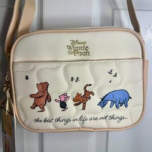 NWT. Winnie The Pooh crossbody camera bag from Disney Primark.